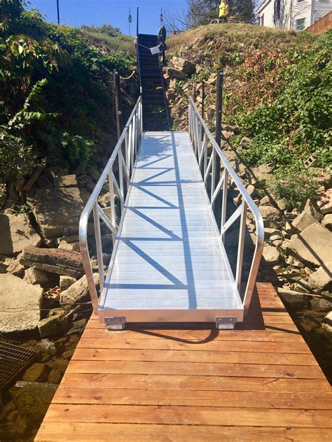 Steel and aluminum dock gangways or ramps .